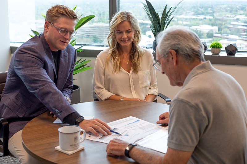 A Heirloom advisor reviewing a personalized financial plan with a client